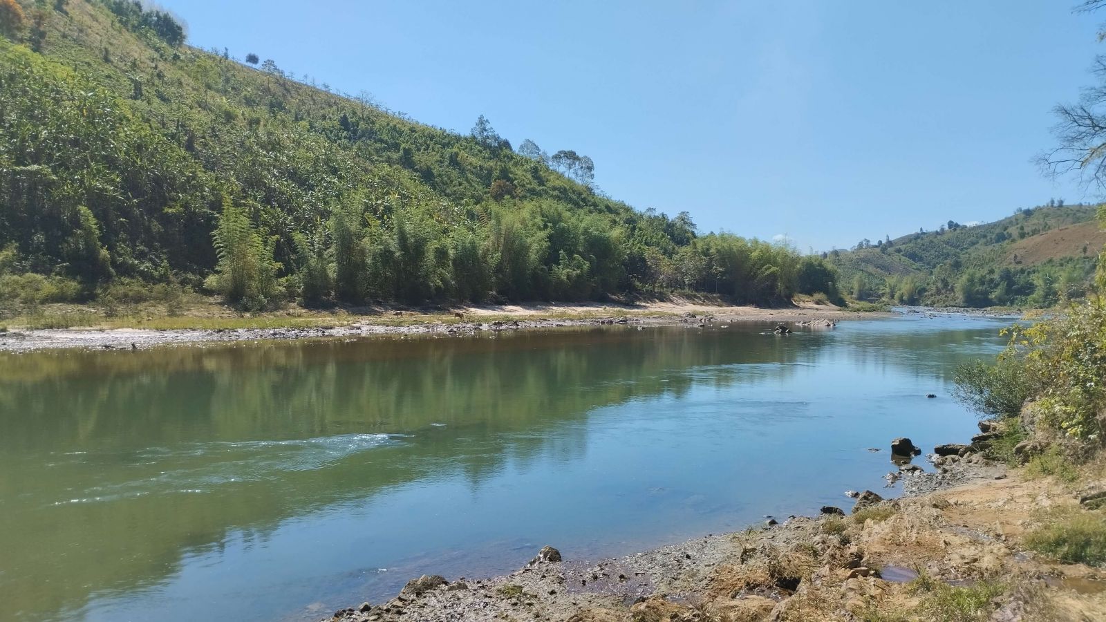 Dak Bla river next to the village