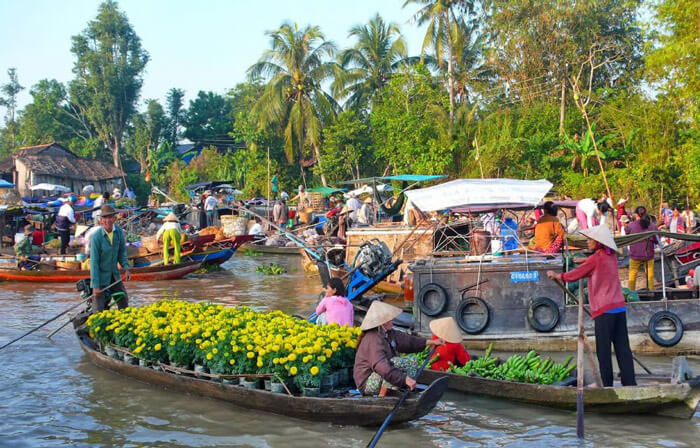 Floating market in Mekong delta - a must see one in Vietnam