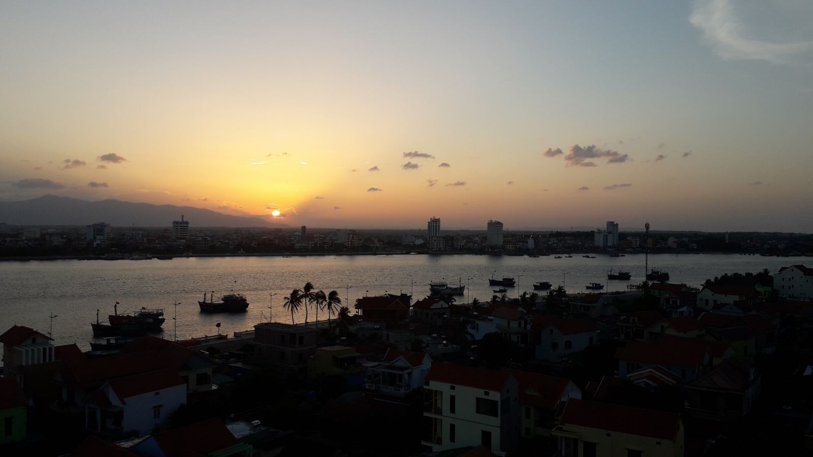 Sunset on Nhat Le river