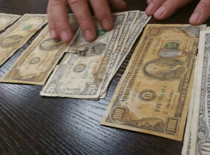 old & torn usd