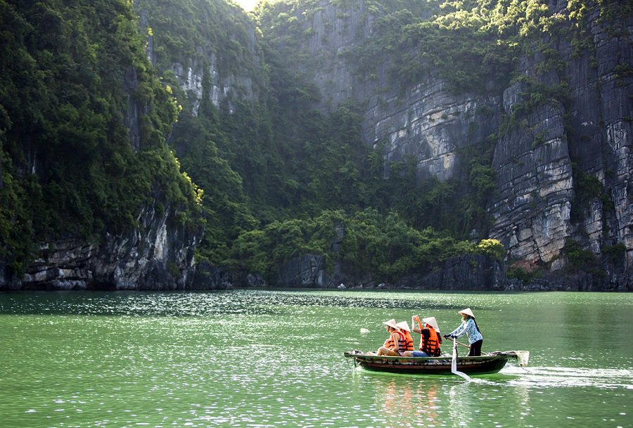 Boat rowing in dark/light cave