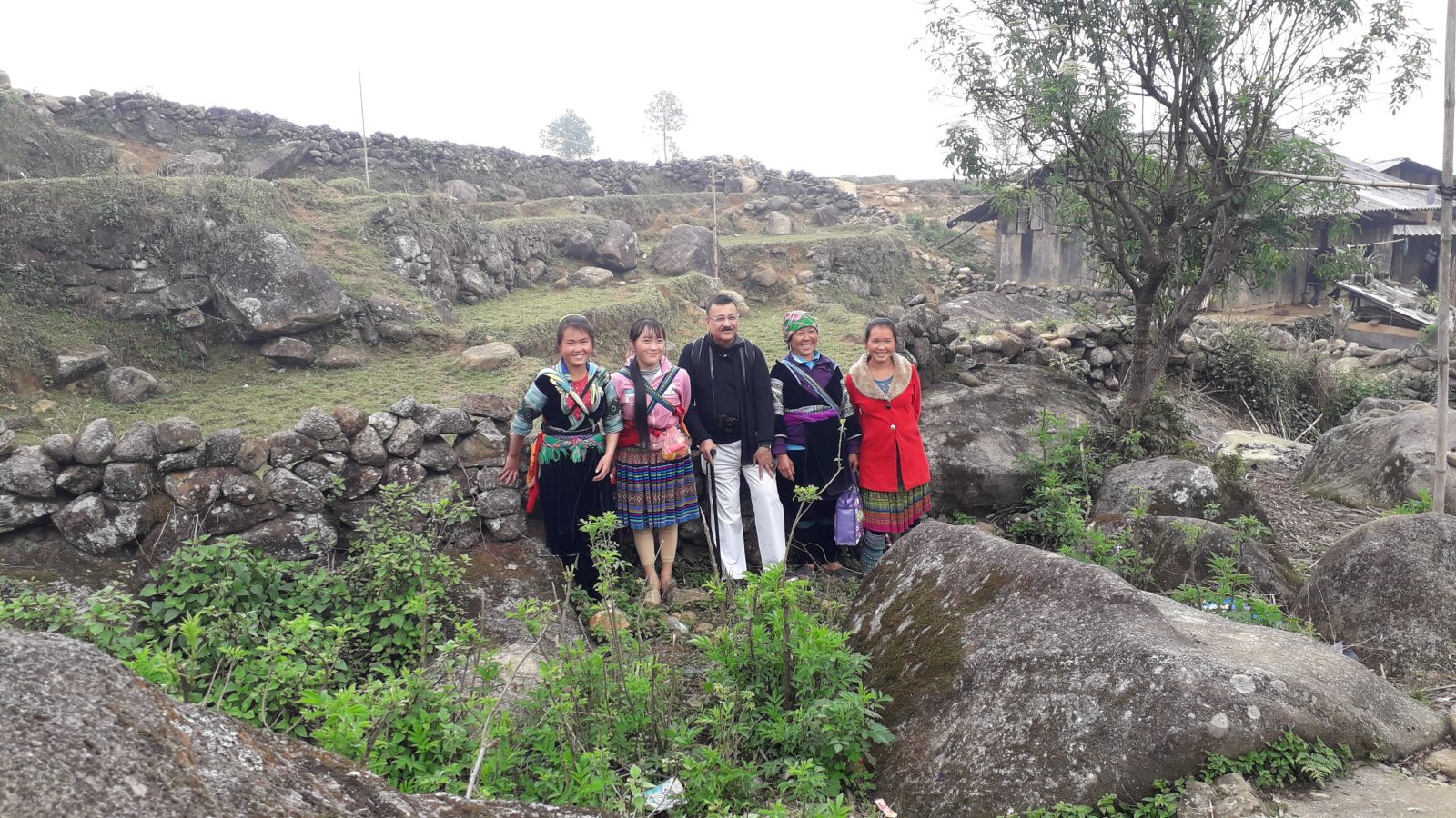 Ta Giang Phin photos with locals