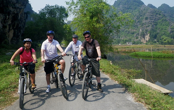 Biking through limestone mountains in Ninh Binh
